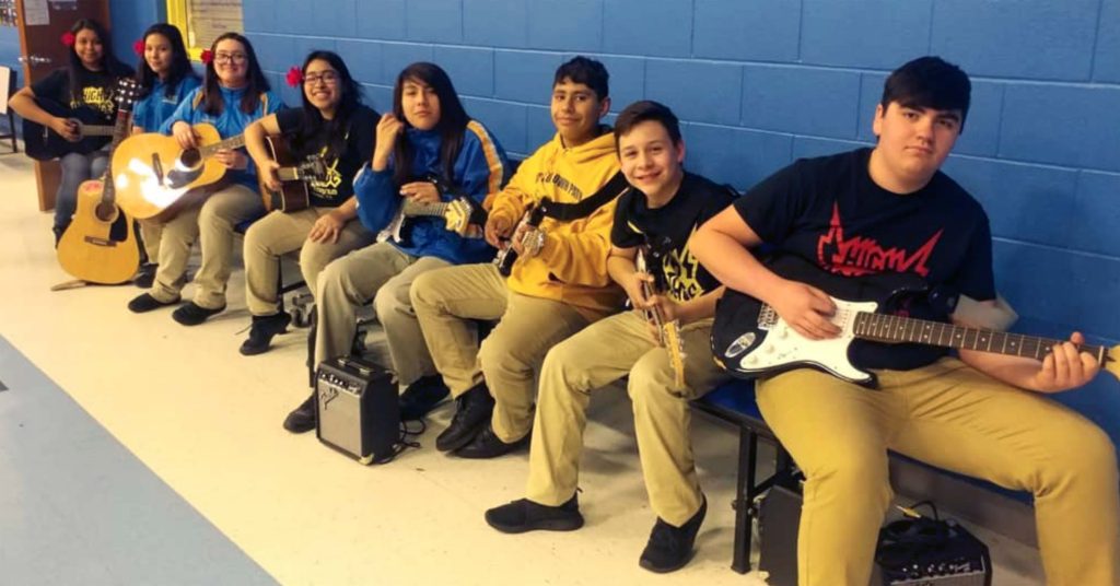 High Voltage kids in a line